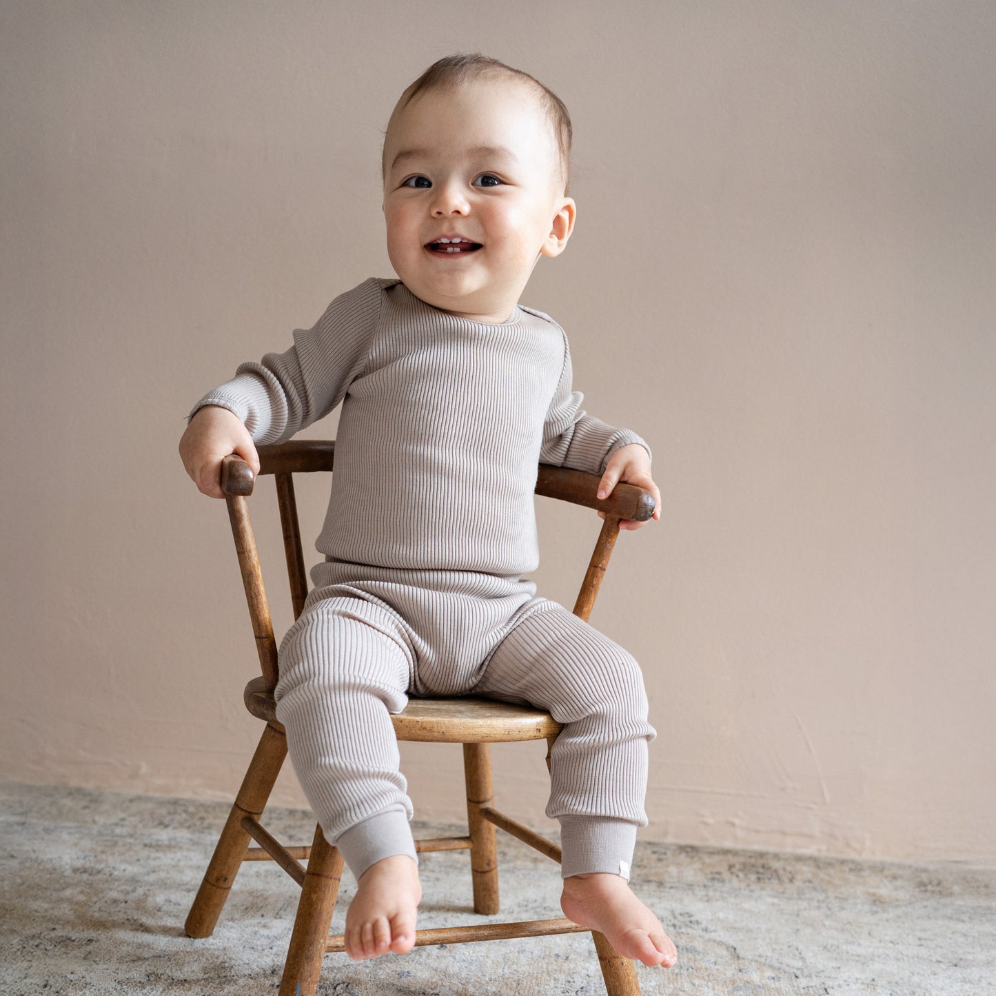 Minimalisma - Alaska Baby Langarm Body in Camle Melange aus 100 % Merinowolle